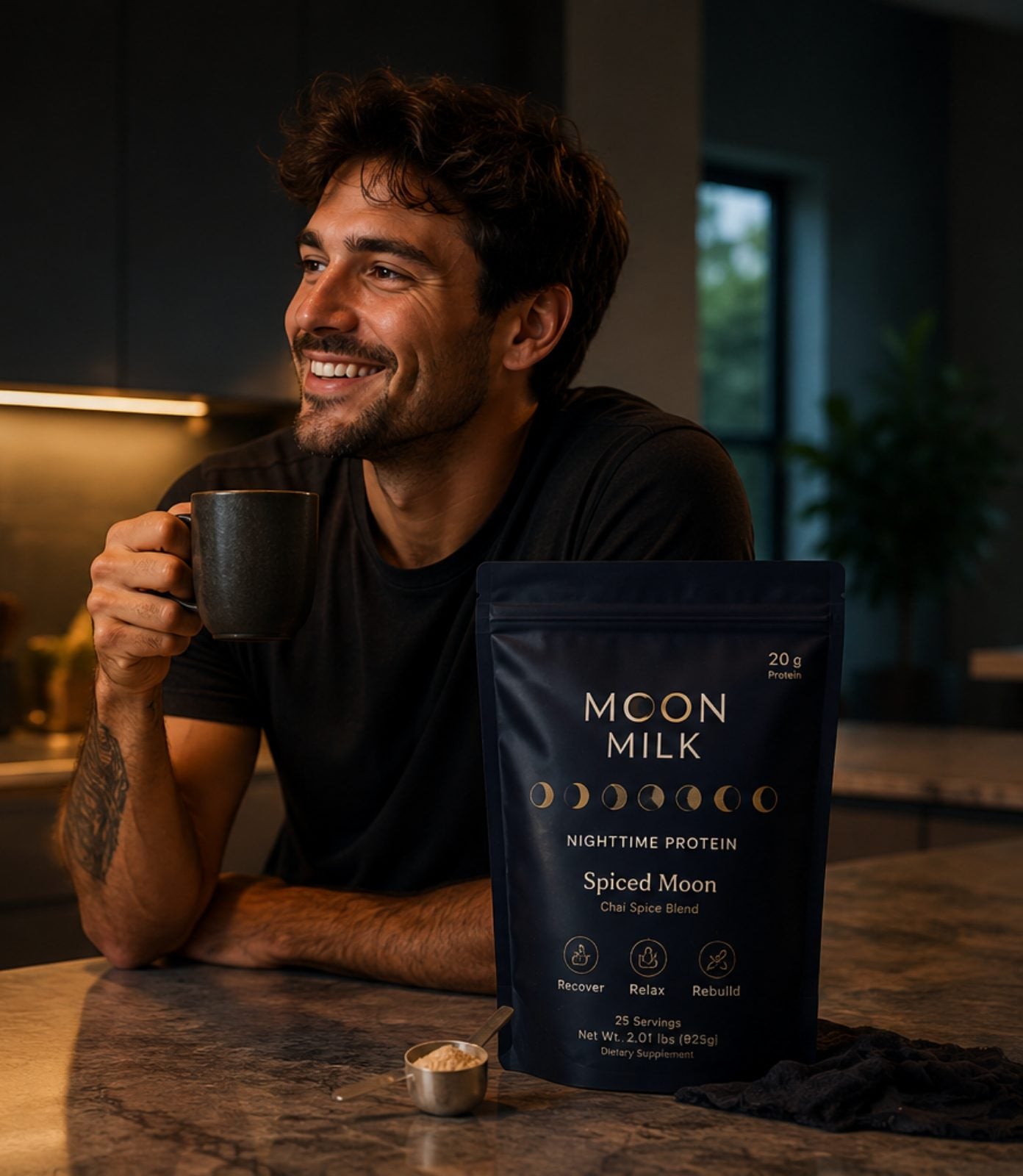 Man enjoying a warm mug of Moon Milk in his kitchen beside a Spiced Moon bag